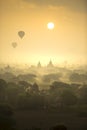 Sunrise scene hot air balloons fly over pagoda ancient city field in Bagan Myanmar.High image quality Royalty Free Stock Photo