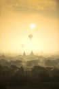 Sunrise scene hot air balloons fly over pagoda ancient city field in Bagan Myanmar.High image quality