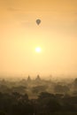 Sunrise scene hot air balloons fly over pagoda ancient city field in Bagan Myanmar.High image quality