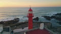 Sunrise scenery sea lighthouse drone view. Beautiful beacon standing rocky coast Royalty Free Stock Photo
