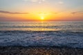 Sunrise at the sea. Beautiful summer view seascape. Amazing sunrise. Morning landscape. Waves with foam. Romantic relax places Royalty Free Stock Photo