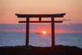 Sunrise and sea at Japanese shinto gate