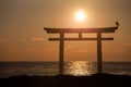 Sunrise and sea at Japanese shinto gate Royalty Free Stock Photo