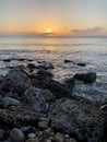 Sunrise on the sea in the middle of a stone beach in Georgia Royalty Free Stock Photo