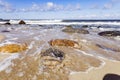 Sunrise on the sea - Sea wave crash on big stone in beautiful white splashes. Seascape. Panoramic view of the seashore