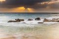 Sunrise Seascape ith Sun Rays under the Rain Cloud Royalty Free Stock Photo