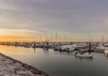 Sunrise seascape view of Olhao Marina, waterfront to Ria Formosa natural park. Algarve