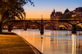 Sunrise on the Seine River banks and Pont des Arts, Paris, France Royalty Free Stock Photo