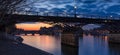 Sunrise on the Seine River with Pont des Arts and Pont Neuf. Ile de la Cite, Paris, France Royalty Free Stock Photo