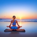 Sunrise Serenity: Beach Yoga Bliss Royalty Free Stock Photo