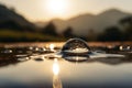 Sunrise Serenity: Capturing the Beauty of a Water Droplet in a Calm Pool