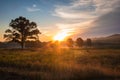 Sunrise shines on field over mountain in early summer Royalty Free Stock Photo