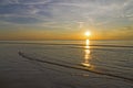 Sunrise with shining indyllic on sand at beach