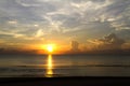 Sunrise shining on water beautiful on baech Royalty Free Stock Photo