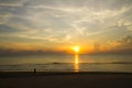 Sunrise shining on water idyllic on beach Royalty Free Stock Photo