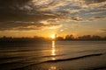 Sunrise shot over the sea and beautiful cloud. sun disappeared behind a big cloud over ocean