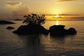 Sunrise with sihouetted rocks, Malawi.