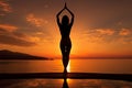 Sunrise silhouette A beautiful woman engages in morning yoga tranquility Royalty Free Stock Photo