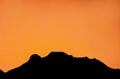 A sunrise with silhouette of the Iztaccihuatl volcano