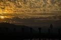 Sunrise with silhouette of Statue of Unity in the photograph