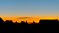 Sunrise silhouettes, Monument Valley