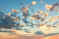 Sunrise sky with gentle colors of soft clouds and sun rays Royalty Free Stock Photo