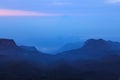 The sunrise sky and the morning mist at the Adam's Peak, Sri Lanka Royalty Free Stock Photo