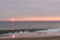 sunrise sky with shore birds and seagulls flying over the Atlantic Ocean near the Shark River Inlet Royalty Free Stock Photo