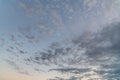 Before sunrise the sky, soft grey clouds and partial moon