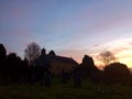 Sunrise at a small rural English church and graveyard Royalty Free Stock Photo