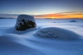 Sunrise and snowy beach