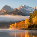 Sunrise Sonata: Lake and Mountains Awaken in Morning Fog Royalty Free Stock Photo