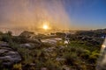 Sunrise through the spray of a flooded Augrabies Falls