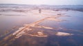 Sunrise spring melting river flood aerial panorama. Overflow water at springtime. Rural April landscape Royalty Free Stock Photo