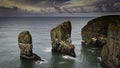 Sunrise at stack rocks on dramatic coast of Pembrokeshire, South Wales, UK Royalty Free Stock Photo