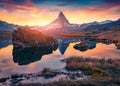 Sunrise Stellisee lake with Matterhorn peak on background.