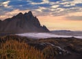 Sunrise Stokksnes cape sea beach and Vestrahorn Mountain, Iceland. Amazing nature scenery, popular travel destination. Autumn