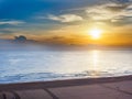 Sunrise are the sun low on the horizon and reflections in the sea at the beach of gandia, spain Royalty Free Stock Photo