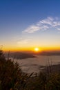 Sunrise or Sunset Landscape of the mountain and sea of mist in winter sunrise view from top of Doi Pha Tang mountain , Chiang Rai, Royalty Free Stock Photo