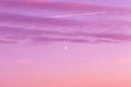 Sunrise, sunset pink violet blue sky with clouds and crescent moon background texture
