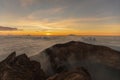 Sunrise at the top of agung volcano. crater view Royalty Free Stock Photo