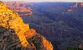 Sunrise touches the upper walls of the Grand Canyon at remote Zuni Point, Grand Canyon National Park, Arizona