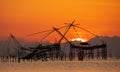 Sunrise with traditional fishing trap in Pak Pra village, Phatthalung, Thailand Royalty Free Stock Photo