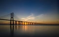 Sunrise at Vasco da Gama Bridge, the longest bridge in Europe, who spans the Tagus River, in Lisbon, Portugal Royalty Free Stock Photo