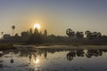 Sunrise view of ancient temple complex Angkor Wat and lake reflection, Siem Reap, Cambodia Royalty Free Stock Photo