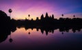 Sunrise view of popular tourist attraction ancient temple complex Angkor Wat with reflected in lake Siem Reap, Cambodia Royalty Free Stock Photo