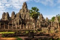 Sunrise view of the Bayon temple in Angkor over blue sky. Cambodia. Horizontal view Royalty Free Stock Photo