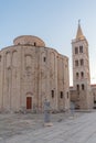 Sunrise view of Bell tower between Saint Donatus church and Saint Anastasia cathedral in Zadar, Croatia Royalty Free Stock Photo