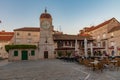 Sunrise view of city loggia at square of Ivana Pavla II in Trogir, Croatia