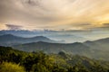 Sunrise view of the himalayan mountain range from a lodge in Chisapani with terraced mountains in the foreground